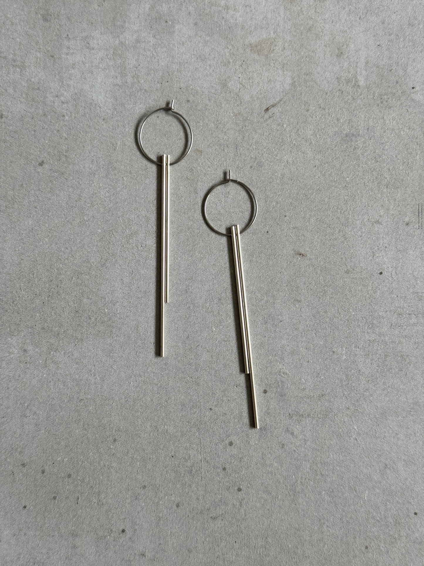 balance long earrings