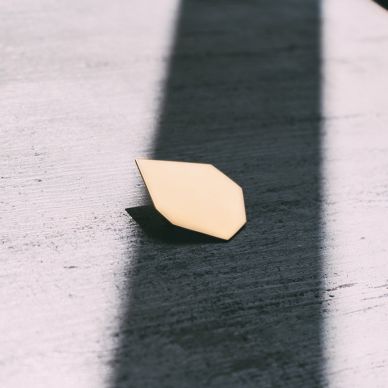 GOLD SHEMESH BROOCH